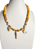 Producto Sunset Ocean Necklace - Yellow Crystal & Pearl with Sea Charms
 de ejemplo