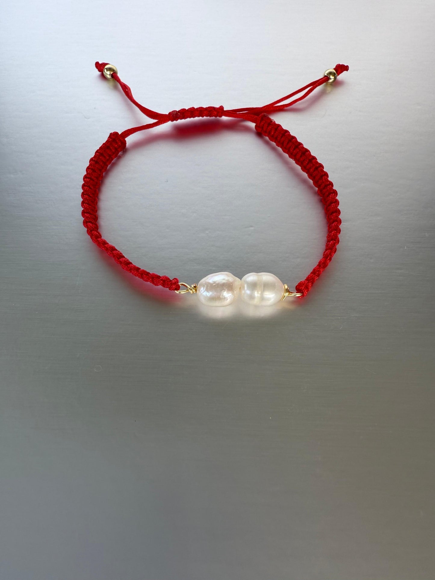 Woven Bracelet With Two Pearls